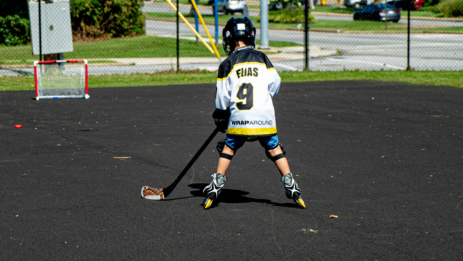 A Kid wearing Hockey Kit