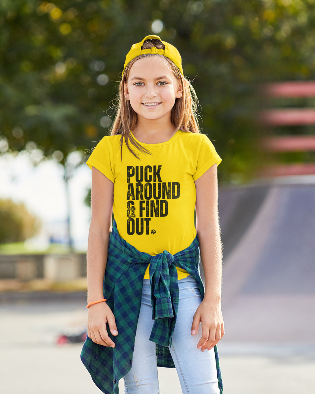 yellow t-shirt with black text on young lady